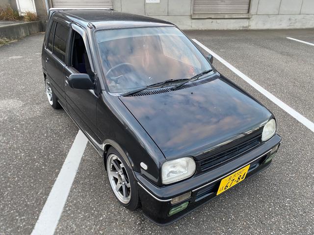 ミラ Ｊ－タイプＱ　５速マニュアル　社外ショック＆スプリング　ワンオフマフラー　アヴァンツアート内装換装　フェンダートリム　社外アルミ　Ｂｌｕｅｔｏｏｔｈ対応オーディオ　車検整備付（8枚目）