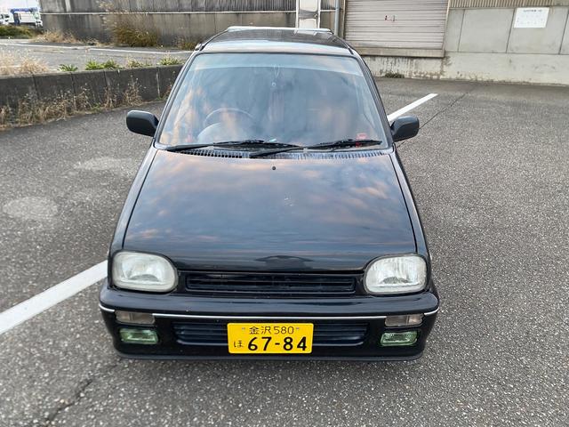 ミラ Ｊ－タイプＱ　５速マニュアル　社外ショック＆スプリング　ワンオフマフラー　アヴァンツアート内装換装　フェンダートリム　社外アルミ　Ｂｌｕｅｔｏｏｔｈ対応オーディオ　車検整備付（11枚目）