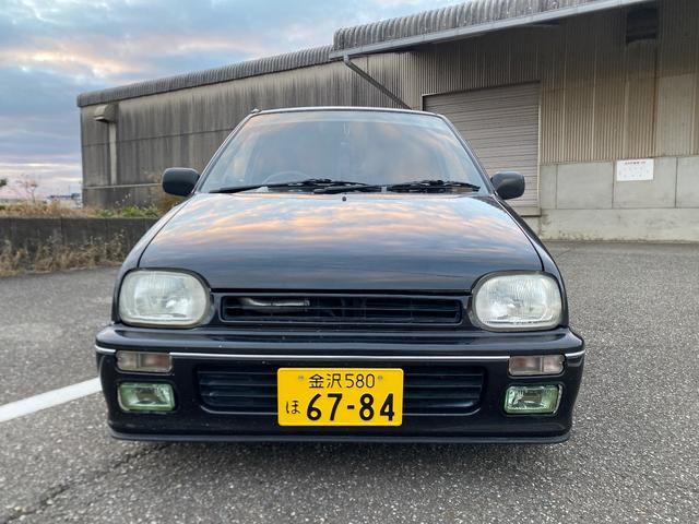 ミラ Ｊ－タイプＱ　５速マニュアル　社外ショック＆スプリング　ワンオフマフラー　アヴァンツアート内装換装　フェンダートリム　社外アルミ　Ｂｌｕｅｔｏｏｔｈ対応オーディオ　車検整備付（12枚目）