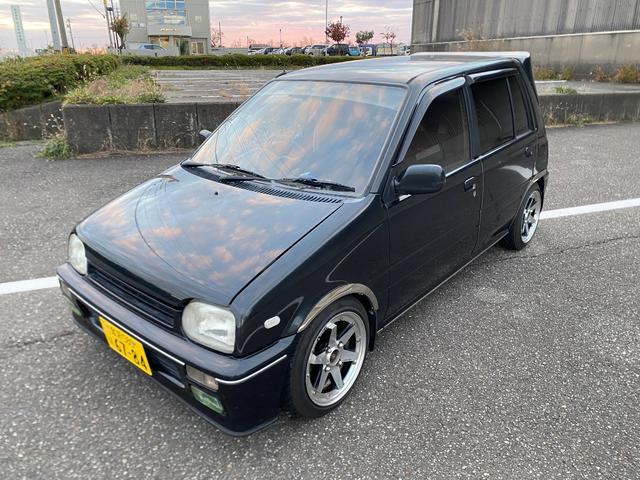 ミラ Ｊ－タイプＱ　５速マニュアル　社外ショック＆スプリング　ワンオフマフラー　アヴァンツアート内装換装　フェンダートリム　社外アルミ　Ｂｌｕｅｔｏｏｔｈ対応オーディオ　車検整備付（15枚目）