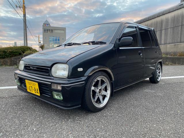 ミラ Ｊ－タイプＱ　５速マニュアル　社外ショック＆スプリング　ワンオフマフラー　アヴァンツアート内装換装　フェンダートリム　社外アルミ　Ｂｌｕｅｔｏｏｔｈ対応オーディオ　車検整備付（16枚目）