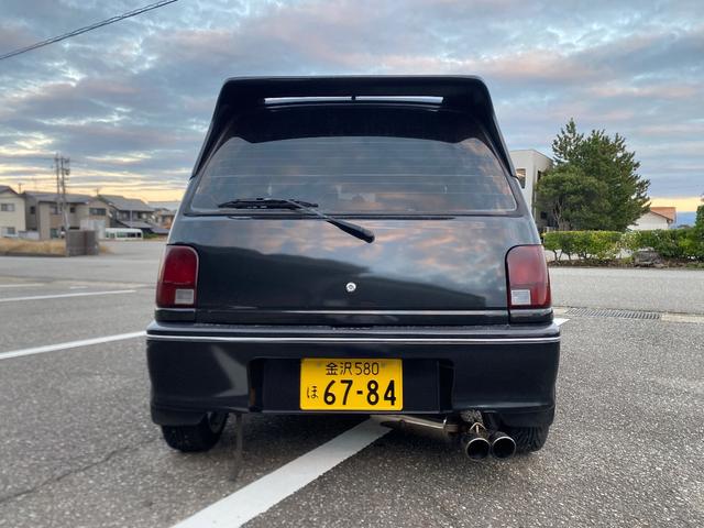 ミラ Ｊ－タイプＱ　５速マニュアル　社外ショック＆スプリング　ワンオフマフラー　アヴァンツアート内装換装　フェンダートリム　社外アルミ　Ｂｌｕｅｔｏｏｔｈ対応オーディオ　車検整備付（21枚目）