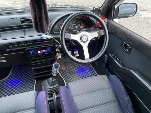 ミラ Ｊ－タイプＱ　５速マニュアル　社外ショック＆スプリング　ワンオフマフラー　アヴァンツアート内装換装　フェンダートリム　社外アルミ　Ｂｌｕｅｔｏｏｔｈ対応オーディオ　車検整備付（33枚目）