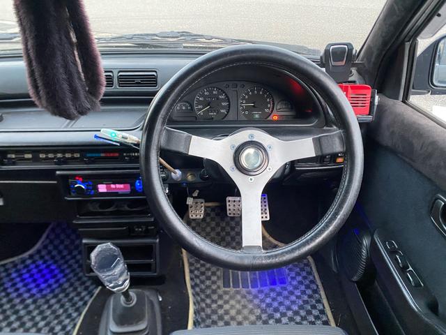 ミラ Ｊ－タイプＱ　５速マニュアル　社外ショック＆スプリング　ワンオフマフラー　アヴァンツアート内装換装　フェンダートリム　社外アルミ　Ｂｌｕｅｔｏｏｔｈ対応オーディオ　車検整備付（35枚目）