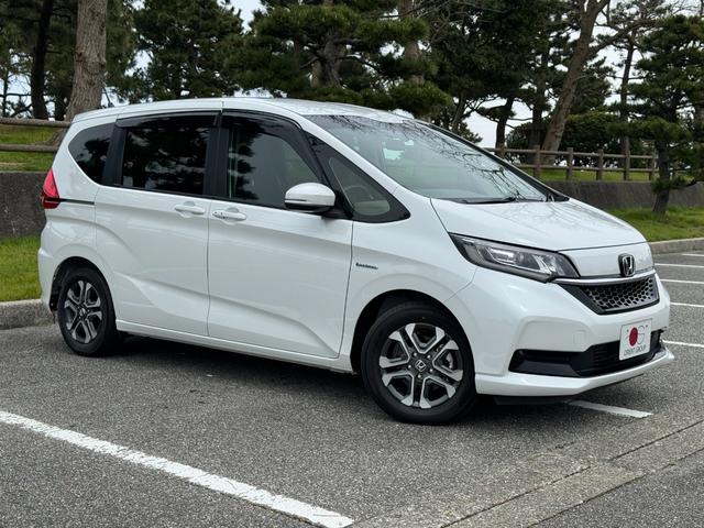 フリード＋ハイブリッド ハイブリッドＧ・ホンダセンシング　Ｃパッケージ　禁煙車　両側電動スライドドア　ナビ　バックカメラ　前後ドライブレコーダー　ＥＴＣ　クルーズコントロール　レーンアシスト　横滑り防止　衝突被害軽減ブレーキ　シートヒーター（2枚目）