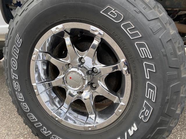 ダットサントラック ＷキャブＡＸ－Ｇ　フルＵＳ仕様　希少パーツ　リフトアップ４ＷＤ　トラック　ＭＴ　ナビ　アルミホイール　エアコン　パワーステアリング　パワーウィンドウ（20枚目）