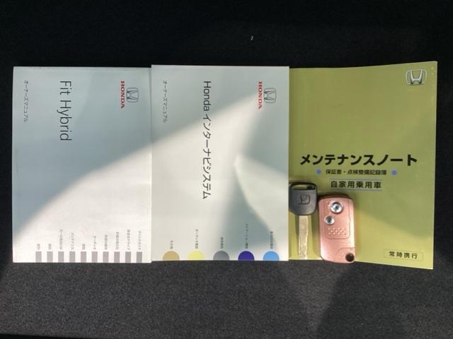 フィットハイブリッド シーズ 保証付ワンオ-ナ-純正ナビTV DVD再生 横滑り防止 バックカメラ ETC スマートキー ワンセグ キーレスキー イモビ ワンオーナー パワステ ABS AUTOエアコン(15枚目)