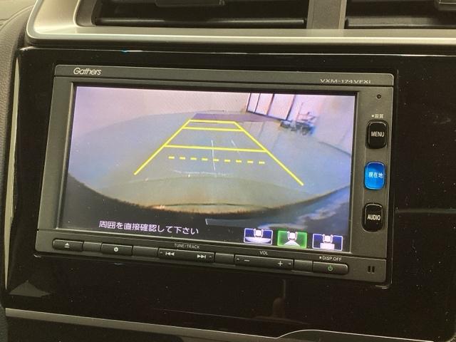 フィットハイブリッド Ｆ　１年保証　ワンオ－ナ－　ナビＶＸＭ－１７４ＶＦＸｉ　ＴＶ　Ｒカメラ　ＢＴオ－ディオ　ＤＶＤ　ＥＴＣ　ＬＥＤライト　ＶＳＡ　スマ－トキ－　盗難防止装置　整備記録簿　ＡＡＣ　ドアバイザ－　Ｗエアバッグ（5枚目）