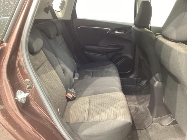 フィットハイブリッド Ｆ　１年保証　ワンオ－ナ－　ナビＶＸＭ－１７４ＶＦＸｉ　ＴＶ　Ｒカメラ　ＢＴオ－ディオ　ＤＶＤ　ＥＴＣ　ＬＥＤライト　ＶＳＡ　スマ－トキ－　盗難防止装置　整備記録簿　ＡＡＣ　ドアバイザ－　Ｗエアバッグ（18枚目）