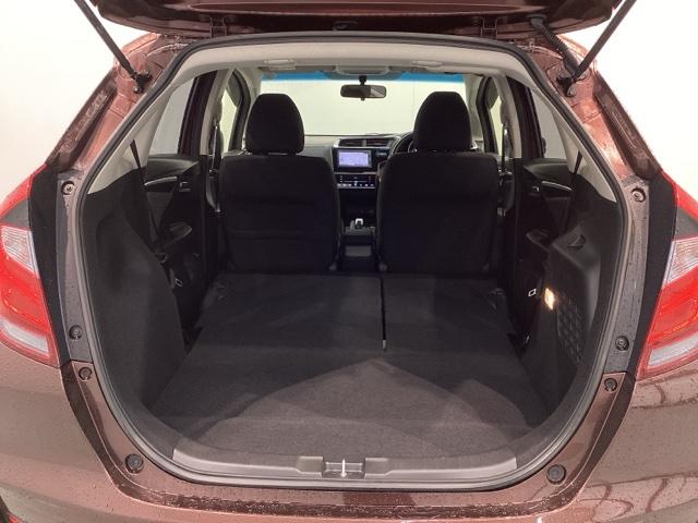 フィットハイブリッド Ｆ　１年保証　ワンオ－ナ－　ナビＶＸＭ－１７４ＶＦＸｉ　ＴＶ　Ｒカメラ　ＢＴオ－ディオ　ＤＶＤ　ＥＴＣ　ＬＥＤライト　ＶＳＡ　スマ－トキ－　盗難防止装置　整備記録簿　ＡＡＣ　ドアバイザ－　Ｗエアバッグ（19枚目）