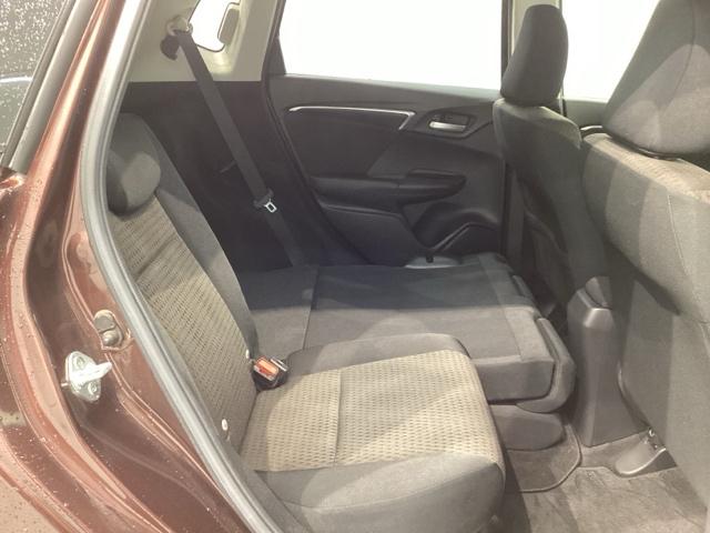 フィットハイブリッド Ｆ　１年保証　ワンオ－ナ－　ナビＶＸＭ－１７４ＶＦＸｉ　ＴＶ　Ｒカメラ　ＢＴオ－ディオ　ＤＶＤ　ＥＴＣ　ＬＥＤライト　ＶＳＡ　スマ－トキ－　盗難防止装置　整備記録簿　ＡＡＣ　ドアバイザ－　Ｗエアバッグ（29枚目）