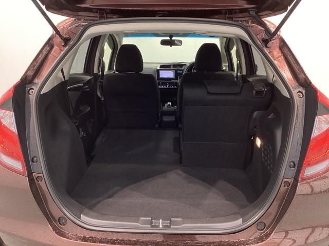 フィットハイブリッド Ｆ　１年保証　ワンオ－ナ－　ナビＶＸＭ－１７４ＶＦＸｉ　ＴＶ　Ｒカメラ　ＢＴオ－ディオ　ＤＶＤ　ＥＴＣ　ＬＥＤライト　ＶＳＡ　スマ－トキ－　盗難防止装置　整備記録簿　ＡＡＣ　ドアバイザ－　Ｗエアバッグ（30枚目）