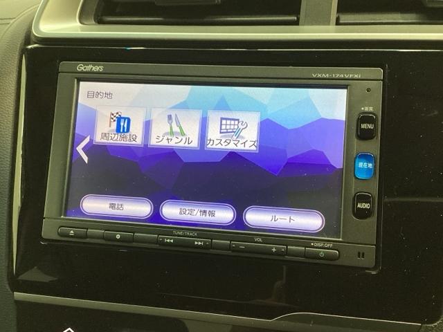 フィットハイブリッド Ｆ　１年保証　ワンオ－ナ－　ナビＶＸＭ－１７４ＶＦＸｉ　ＴＶ　Ｒカメラ　ＢＴオ－ディオ　ＤＶＤ　ＥＴＣ　ＬＥＤライト　ＶＳＡ　スマ－トキ－　盗難防止装置　整備記録簿　ＡＡＣ　ドアバイザ－　Ｗエアバッグ（35枚目）