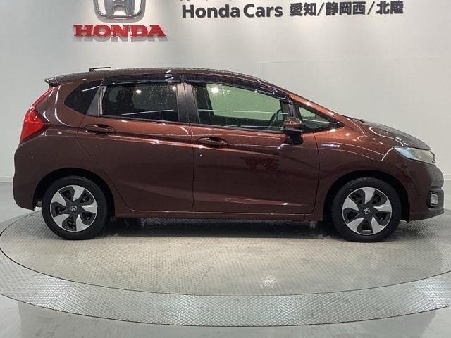 フィットハイブリッド Ｆ　１年保証　ワンオ－ナ－　ナビＶＸＭ－１７４ＶＦＸｉ　ＴＶ　Ｒカメラ　ＢＴオ－ディオ　ＤＶＤ　ＥＴＣ　ＬＥＤライト　ＶＳＡ　スマ－トキ－　盗難防止装置　整備記録簿　ＡＡＣ　ドアバイザ－　Ｗエアバッグ（45枚目）