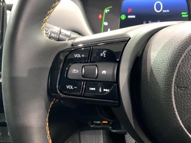 フィット ｅ：ＨＥＶＲＳ　Ｈ　ＳＥＮＳＩＮＧ　最長５年保証　ワンオ－ナ－　純正ナビ　ＴＶ　Ｒカメラ　ＢＴオ－ディオ　ＥＴＣ　ＬＥＤライト　横滑り防止　クルコン　アルミ　スマ－トキ－　盗難防止装置　整備記録簿　ＡＡＣ　スペアキ－（10枚目）