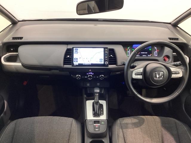 フィット e:HEVホーム H SENSING 新車保証 試乗車 ワンオ-ナ- ナビVXU-245FTi TV Rカメラ CD録音 BTオ-ディオ DVD ETC LEDライト VSA クルコン スマ-トキ- 盗難防止装置(9枚目)