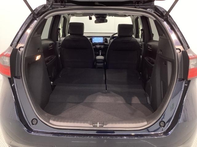 フィット e:HEVホーム H SENSING 新車保証 試乗車 ワンオ-ナ- ナビVXU-245FTi TV Rカメラ CD録音 BTオ-ディオ DVD ETC LEDライト VSA クルコン スマ-トキ- 盗難防止装置(19枚目)