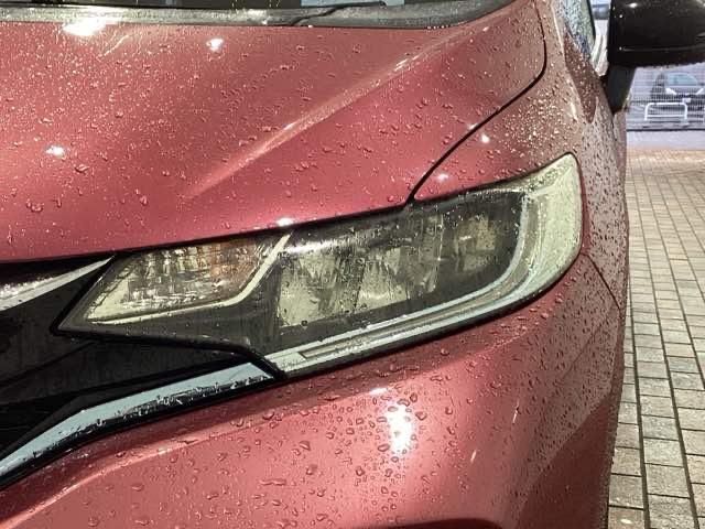 フィットハイブリッド Ｓホンダセンシング　１年保証　ワンオ－ナ－　ナビＶＸＭ－１８５ＶＦＥｉ　ＴＶ　Ｒカメラ　ＣＤ録音　ＢＴオ－ディオ　ＤＶＤ　ＥＴＣ　ＬＥＤライト　ＶＳＡ　クルコン　スマ－トキ－　スペアキ－　盗難防止装置　整備記録簿　ＡＡＣ（7枚目）