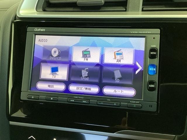 フィットハイブリッド Ｆパッケージ　１年保証ナビフルセグＲカメラＤＶＤ　整備記録簿　スマートキ－　イモビ　リヤカメラ　ＤＶＤ視聴　横滑防止　ＡＡＣ　運転席エアバック　キーレスエントリー　ＡＢＳ　ナビ＆ＴＶ　ＥＴＣ付き　パワーステアリング（35枚目）