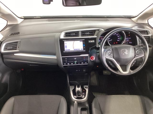 フィットハイブリッド Ｌホンダセンシング　１年保証　ナビ　ＶＸＭ－１７４ＶＦｉ　ＴＶ　Ｒカメラ　ＣＤ録音　ＢＴオ－ディオ　ＤＶＤ　ＥＴＣ　ＬＥＤライト　ＶＳＡ　クルコン　アルミ　スマ－トキ－　盗難防止装置　整備記録簿　ＡＡＣ　スペアキ－　禁煙（9枚目）
