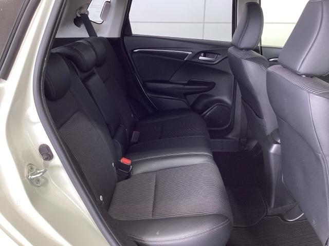 フィットハイブリッド Ｌホンダセンシング　１年保証　ナビ　ＶＸＭ－１７４ＶＦｉ　ＴＶ　Ｒカメラ　ＣＤ録音　ＢＴオ－ディオ　ＤＶＤ　ＥＴＣ　ＬＥＤライト　ＶＳＡ　クルコン　アルミ　スマ－トキ－　盗難防止装置　整備記録簿　ＡＡＣ　スペアキ－　禁煙（19枚目）