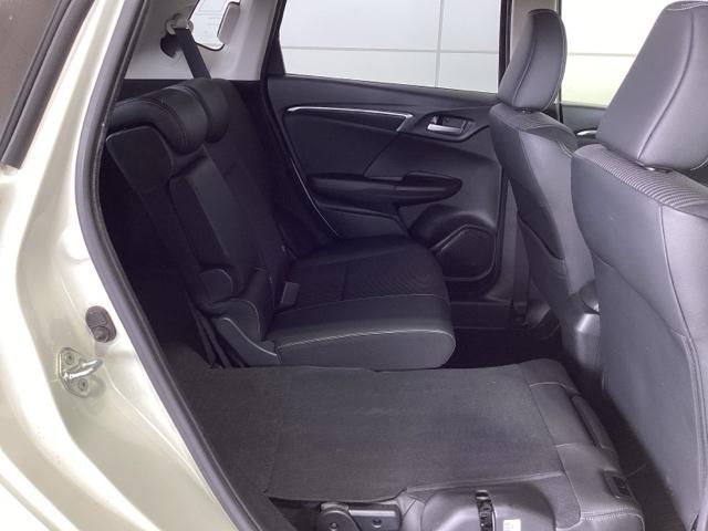 フィットハイブリッド Ｌホンダセンシング　１年保証　ナビ　ＶＸＭ－１７４ＶＦｉ　ＴＶ　Ｒカメラ　ＣＤ録音　ＢＴオ－ディオ　ＤＶＤ　ＥＴＣ　ＬＥＤライト　ＶＳＡ　クルコン　アルミ　スマ－トキ－　盗難防止装置　整備記録簿　ＡＡＣ　スペアキ－　禁煙（31枚目）