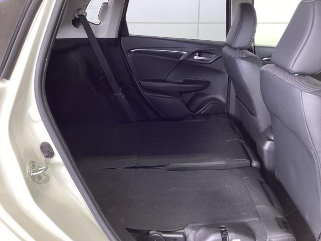 フィットハイブリッド Ｌホンダセンシング　１年保証　ナビ　ＶＸＭ－１７４ＶＦｉ　ＴＶ　Ｒカメラ　ＣＤ録音　ＢＴオ－ディオ　ＤＶＤ　ＥＴＣ　ＬＥＤライト　ＶＳＡ　クルコン　アルミ　スマ－トキ－　盗難防止装置　整備記録簿　ＡＡＣ　スペアキ－　禁煙（32枚目）