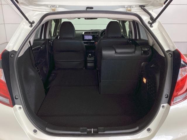 フィットハイブリッド Ｌホンダセンシング　１年保証　ナビ　ＶＸＭ－１７４ＶＦｉ　ＴＶ　Ｒカメラ　ＣＤ録音　ＢＴオ－ディオ　ＤＶＤ　ＥＴＣ　ＬＥＤライト　ＶＳＡ　クルコン　アルミ　スマ－トキ－　盗難防止装置　整備記録簿　ＡＡＣ　スペアキ－　禁煙（34枚目）