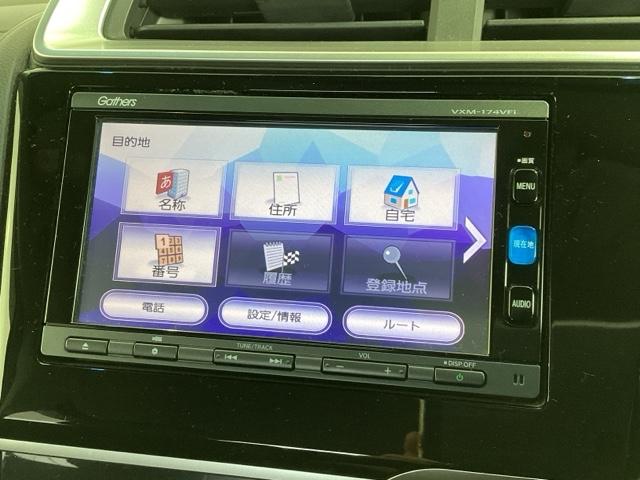 フィットハイブリッド Ｌホンダセンシング　１年保証　ナビ　ＶＸＭ－１７４ＶＦｉ　ＴＶ　Ｒカメラ　ＣＤ録音　ＢＴオ－ディオ　ＤＶＤ　ＥＴＣ　ＬＥＤライト　ＶＳＡ　クルコン　アルミ　スマ－トキ－　盗難防止装置　整備記録簿　ＡＡＣ　スペアキ－　禁煙（37枚目）