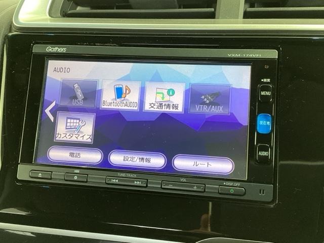 フィットハイブリッド Ｌホンダセンシング　１年保証　ナビ　ＶＸＭ－１７４ＶＦｉ　ＴＶ　Ｒカメラ　ＣＤ録音　ＢＴオ－ディオ　ＤＶＤ　ＥＴＣ　ＬＥＤライト　ＶＳＡ　クルコン　アルミ　スマ－トキ－　盗難防止装置　整備記録簿　ＡＡＣ　スペアキ－　禁煙（40枚目）