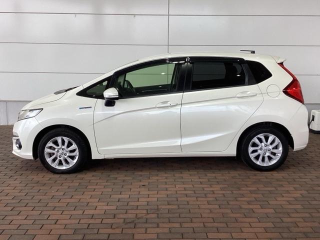 フィットハイブリッド Ｌホンダセンシング　１年保証　ナビ　ＶＸＭ－１７４ＶＦｉ　ＴＶ　Ｒカメラ　ＣＤ録音　ＢＴオ－ディオ　ＤＶＤ　ＥＴＣ　ＬＥＤライト　ＶＳＡ　クルコン　アルミ　スマ－トキ－　盗難防止装置　整備記録簿　ＡＡＣ　スペアキ－　禁煙（53枚目）