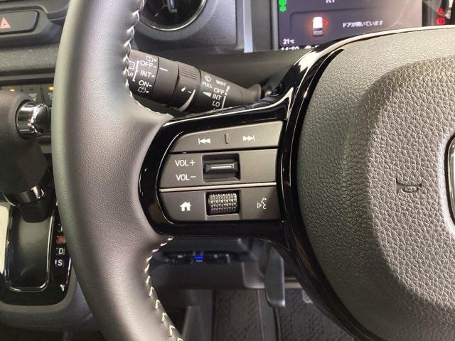 N-BOXカスタム コーディネートスタイル H SENSING 2ト-ン 新車保証 試乗車 ワンオ-ナ- ナビVXM-215ZFEi TV Rカメラ BTオ-ディオ ドラレコ シ-トヒ-タ- ETC LEDライト 両側電動ドア VSA クルコン(10枚目)