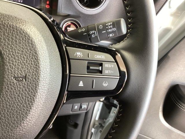 N-BOXカスタム コーディネートスタイル H SENSING 2ト-ン 新車保証 試乗車 ワンオ-ナ- ナビVXM-215ZFEi TV Rカメラ BTオ-ディオ ドラレコ シ-トヒ-タ- ETC LEDライト 両側電動ドア VSA クルコン(11枚目)