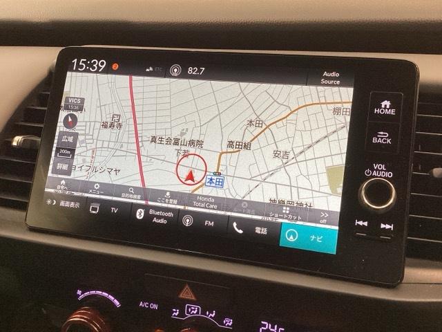 フィット ｅ：ＨＥＶＲＳ　Ｈ　ＳＥＮＳＩＮＧ　最長５年保証　ワンオ－ナ－　純正ナビ　ＴＶ　Ｒカメラ　ＢＴオ－ディオ　ＥＴＣ　ＬＥＤライト　ＶＳＡ　クルコン　アルミ　スマ－トキ－　盗難防止装置　整備記録簿　ＡＡＣ　スペアキ－（6枚目）