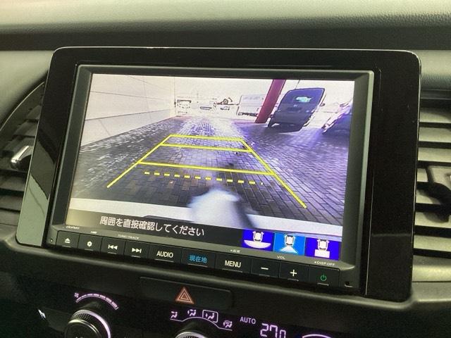 フィット ｅ：ＨＥＶホーム　Ｈ　ＳＥＮＳＩＮＧ　最長５年保証　ワンオ－ナ－　ナビＶＸＭ－２０５ＶＦＥｉ　ＴＶ　Ｒカメラ　ＢＴオ－ディオ　ＤＶＤ　ドラレコ　ＥＴＣ　ＬＥＤライト　ＶＳＡ　クルコン　アルミ　スマ－トキ－　盗難防止装置（6枚目）