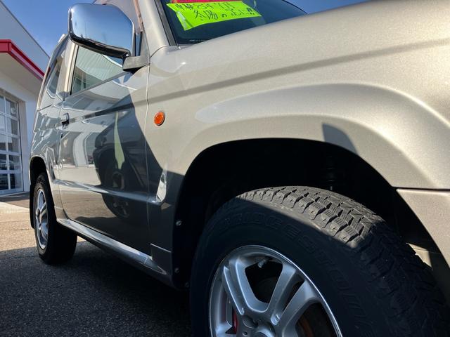 パジェロミニ アクティブフィールドエディション　ターボ　キーレスエントリー　４ＷＤ　ＥＴＣ　アルミホイール　ナビ　ＣＤ　ＤＶＤ　シートヒーター　運転席・助手席エアバック　ＡＢＳ　衝突安全ボディ　エアコン　パワーステアリング　パワーウインドウ（10枚目）