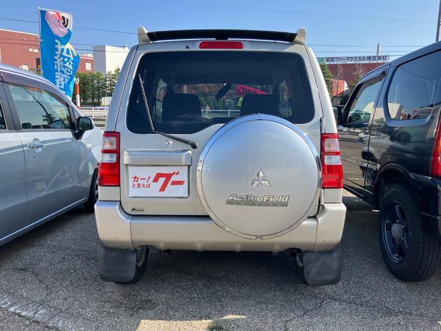 パジェロミニ アクティブフィールドエディション　ターボ　キーレスエントリー　４ＷＤ　ＥＴＣ　アルミホイール　ナビ　ＣＤ　ＤＶＤ　シートヒーター　運転席・助手席エアバック　ＡＢＳ　衝突安全ボディ　エアコン　パワーステアリング　パワーウインドウ（12枚目）