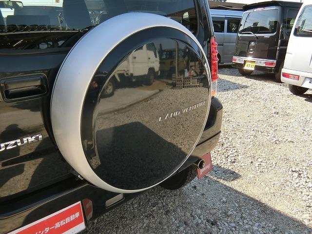 ジムニー ランドベンチャー　切替式４ＷＤ　ターボ　左右シートヒーター　ＬＥＤヘッドランプ　１６インチ大口径タイヤ　３インチリフトアップ　地デジフルセグナビＴＶ　キーレスキー　背面タイヤカバー（5枚目）