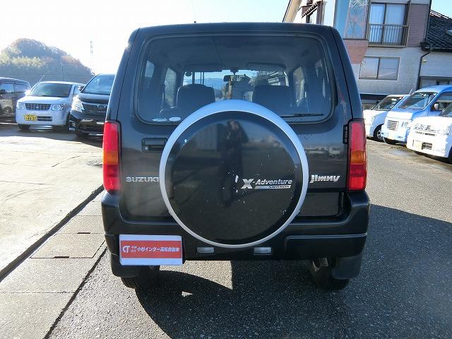 ジムニー クロスアドベンチャーXC 切替式4WD 5速マニュアル車 シートヒーター キーレスキー 純正16インチアルミホイール 専用シート 背面タイヤカバー ドアミラーウインカー(4枚目)