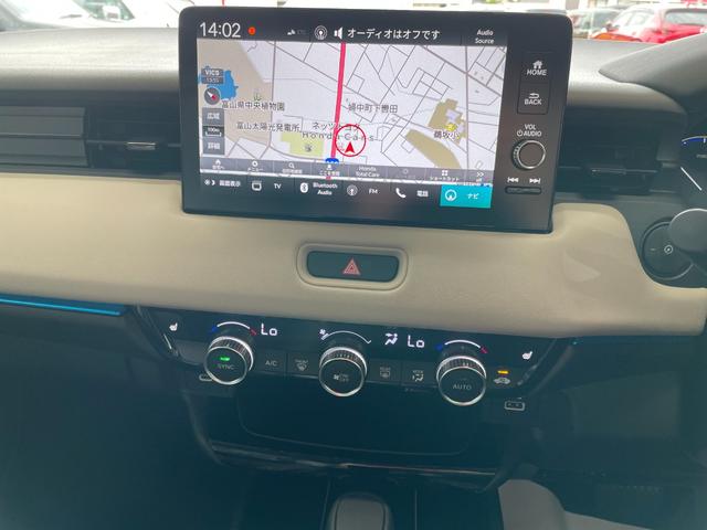 ヴェゼル ｅ：ＨＥＶ　Ｚ・ＰＬａＹパッケージ　登録済未使用車　９型ホンダコネクトナビ　フルセグＢｌｕｅｔｏｏｔｈ　Ｂカメラ　ワイヤレス充電　ＥＴＣ２．０　アダプティブクルコン　ハンドル＆シートヒーター　電動リアゲート　ＬＥＤ　コーナーセンサー（4枚目）