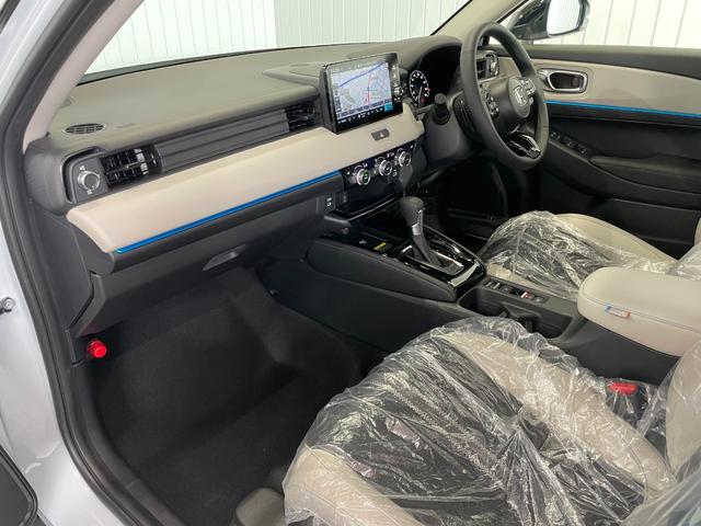 ヴェゼル ｅ：ＨＥＶ　Ｚ・ＰＬａＹパッケージ　登録済未使用車　９型ホンダコネクトナビ　フルセグＢｌｕｅｔｏｏｔｈ　Ｂカメラ　ワイヤレス充電　ＥＴＣ２．０　アダプティブクルコン　ハンドル＆シートヒーター　電動リアゲート　ＬＥＤ　コーナーセンサー（21枚目）