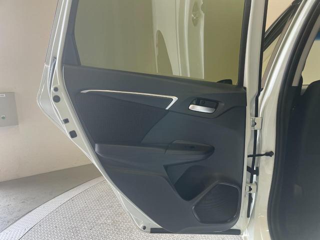 フィットハイブリッド Fパッケージ コンフォートエディション 禁煙車・ETC・バックカメラ・純正ナビ(VXM-174VFi)・フルセグTV・Bluetooth・オートライト・スマートキー・電動格納ミラー ・前席シートヒーター・ステアリングリモコン(50枚目)