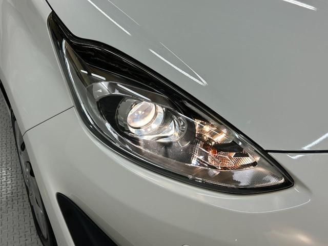 アクア L 禁煙車・トヨタセーフティセンス・社外ナビ(CN-E310D)・バックモニター・Bluetooth・ETC・ステアリングリモコン・電動格納ミラー・スペアキー・レーンアシスト・衝突軽減ブレーキ・後期モデル(27枚目)