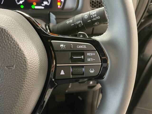ステップワゴン ｅ：ＨＥＶスパーダ　登録済未使用車・ホンダセンシング・マルチビューカメラシステム対応・スペアキー・両側パワースライドドア・前席シートヒーター・パワーバックドア・後席シートバックテーブル・ＬＥＤヘッドライト・オットマン（19枚目）