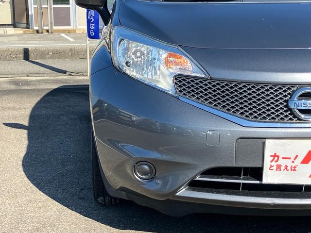 ノート X スマートキー アイドリングストップ ETC ナビ CD 運転席・助手席エアバック ABS ESC 盗難防止システム 衝突安全ボディ エアコン パワーステアリング パワーウインドウ(4枚目)