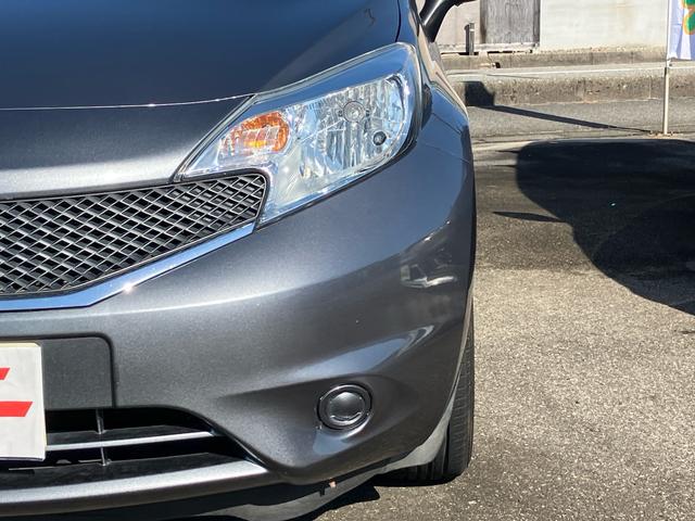 ノート X スマートキー アイドリングストップ ETC ナビ CD 運転席・助手席エアバック ABS ESC 盗難防止システム 衝突安全ボディ エアコン パワーステアリング パワーウインドウ(5枚目)