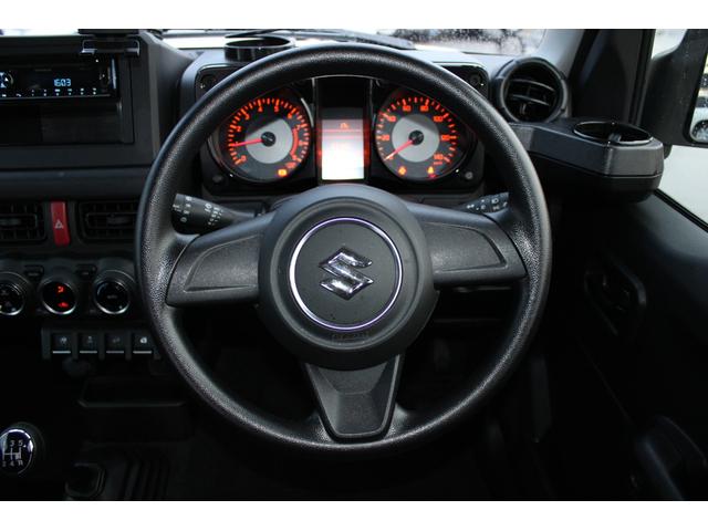 ジムニー XL キーレススタートシステム 禁煙車両 電格ドアミラー スマートキー&プッシュスタート 助手席エアバッグ パートタイム4WD セキュリティ エアバック 横滑り防止機能 パワーウィンドウ フルオートエアコン(10枚目)
