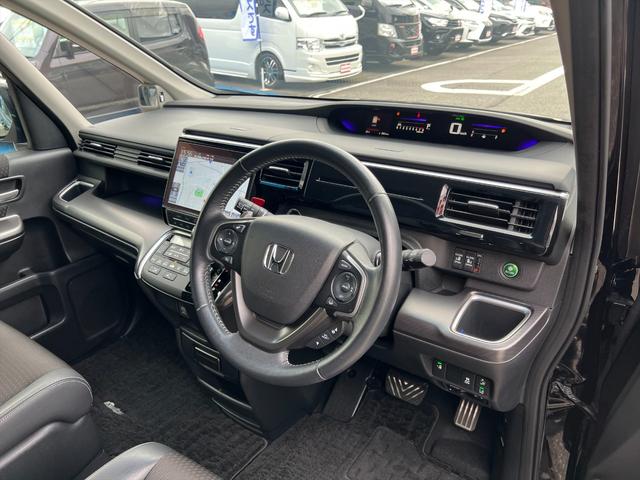 ステップワゴンスパーダ スパーダクールスピリットホンダセンシング後期ナビ後席モニター　後期最終型　ホンダセンシング　アダプティブクルコン　両側パワースライドドア　パドルシフト　純正１０インチナビ　フルセグ　後席フリップダウンモニター　バックカメラ　ビルトインＥＴＣ　半革シート　試乗ＯＫ（28枚目）