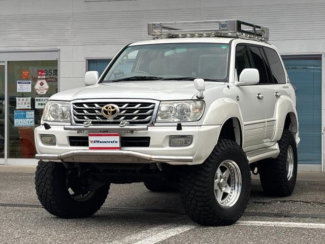ランドクルーザー１００ ＶＸリミテッド４ＷＤバン登録リフトＵＰディーゼルターボ後期型　後期　１オーナー　ディーゼル　リフトＵＰ　オーバーフェンダー　ＺＺＹＺＸアルミ　ＢＦグッドリッチ３７×１３．５Ｒ１８　ＪＡＯＳバンパーガード　ガナドールマフラー　アイバワークスルーフラック　デフロック（3枚目）