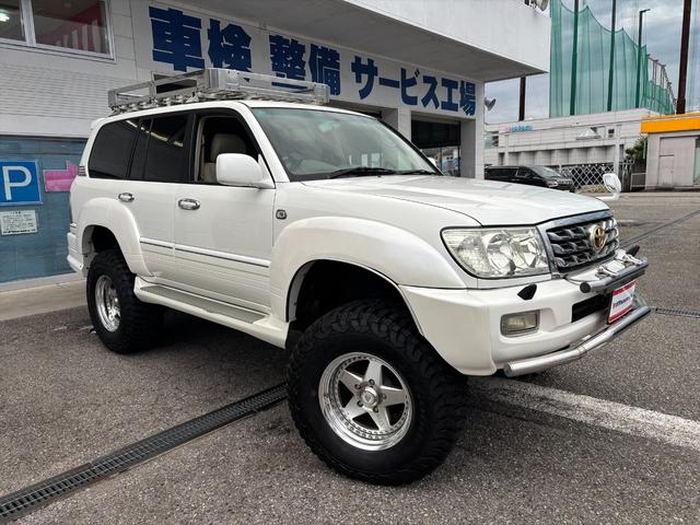 ランドクルーザー１００ ＶＸリミテッド４ＷＤバン登録リフトＵＰディーゼルターボ後期型　後期　１オーナー　ディーゼル　リフトＵＰ　オーバーフェンダー　ＺＺＹＺＸアルミ　ＢＦグッドリッチ３７×１３．５Ｒ１８　ＪＡＯＳバンパーガード　ガナドールマフラー　アイバワークスルーフラック　デフロック（4枚目）